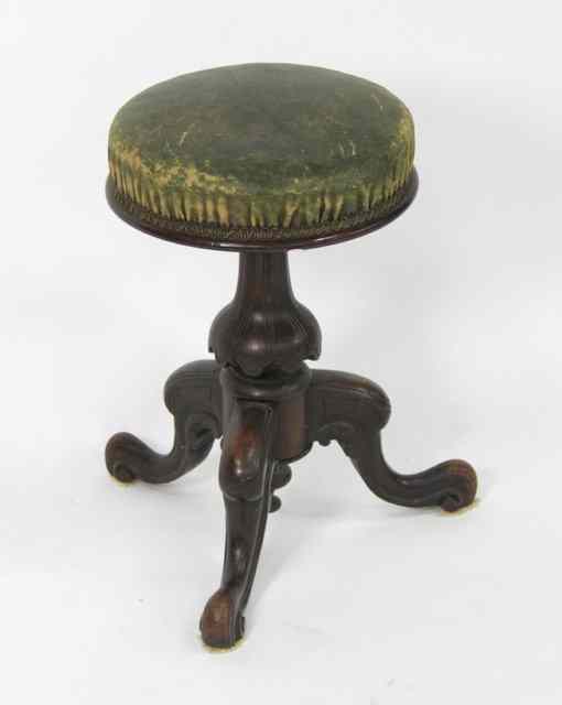 Appraisal: A Victorian adjustable piano stool with circular seat on a