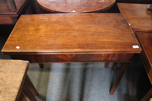 Appraisal: A TH CENTURY MAHOGANY FOLD OVER TEA TABLE with plain