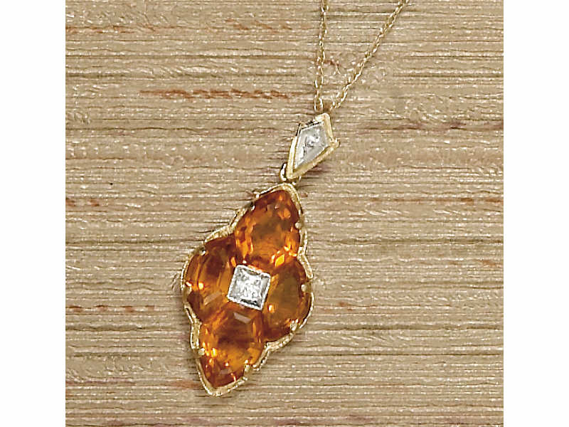 Appraisal: CITRINE SUITE Yellow gold pendant and earring set with caliber