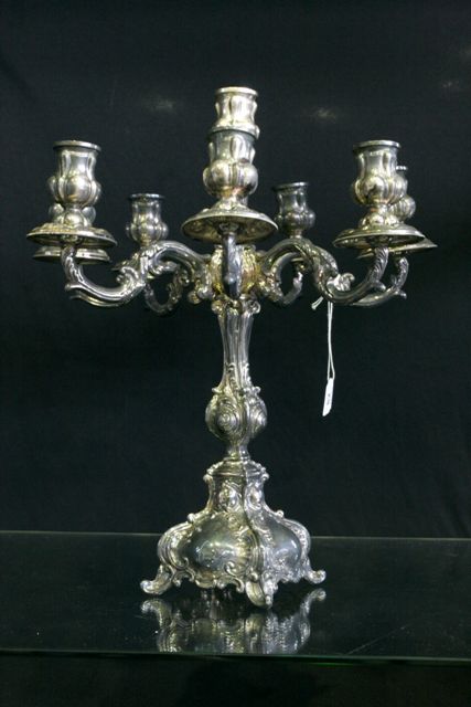 Appraisal: A continental standard silver seven branch candelabra in the Rococo