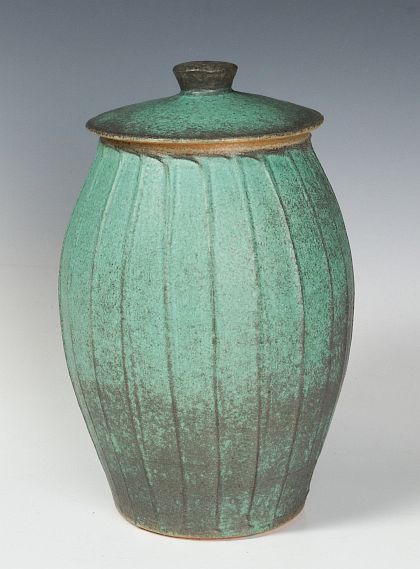 Appraisal: A COVERED STONEWARE JAR SIGNED LOWE With variegated green to