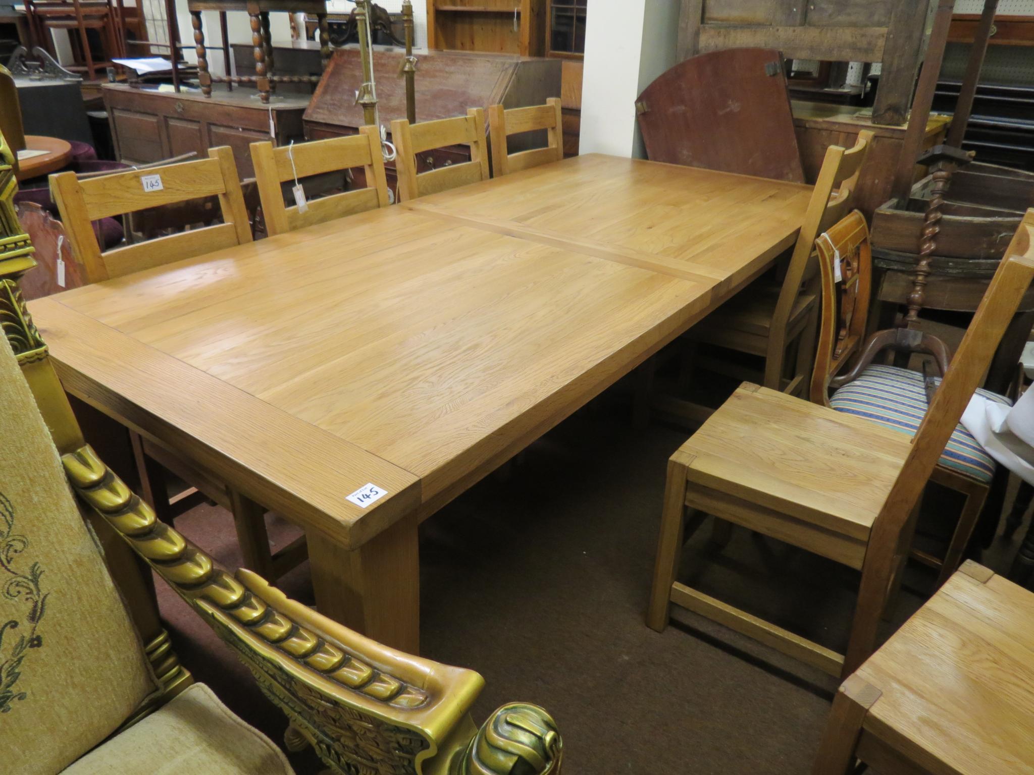 Appraisal: A good quality modern solid light oak dining set table