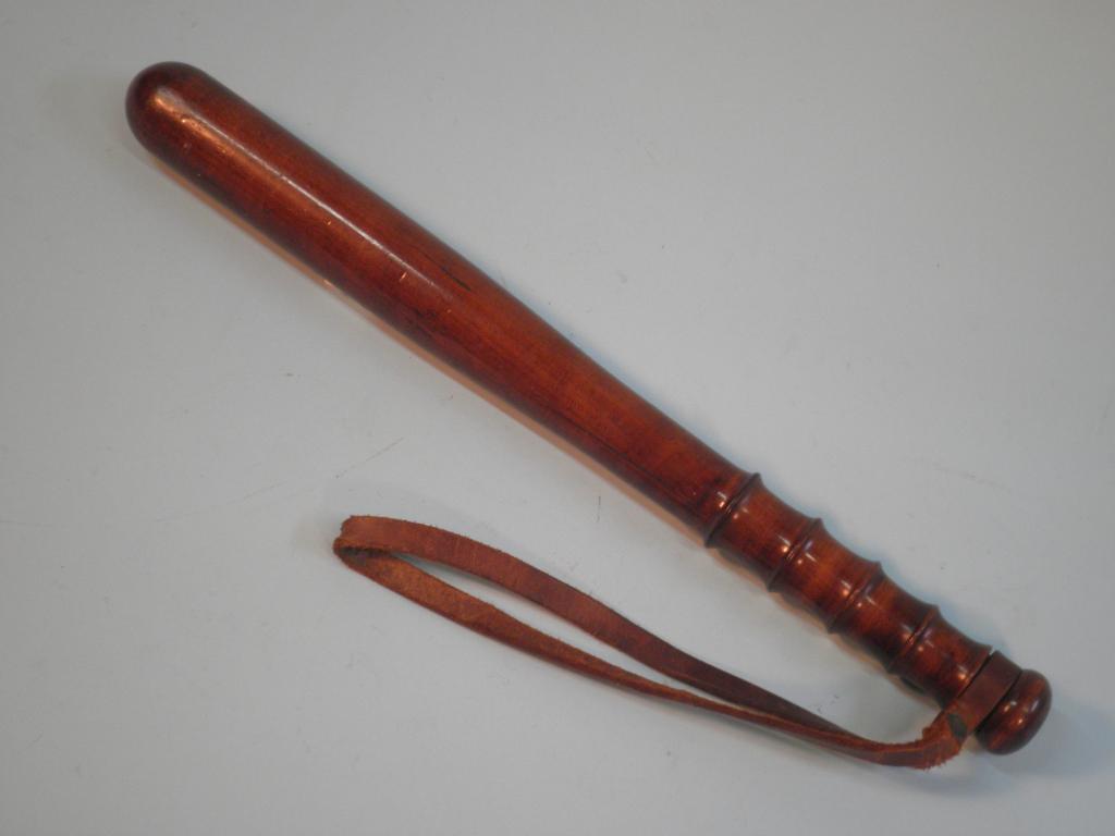 Appraisal: A late thC Early thC fruit wood truncheon