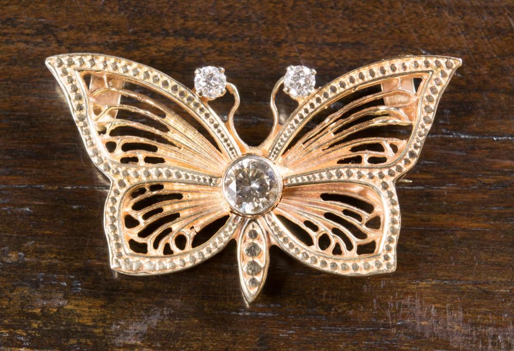 Appraisal: ESTATE DIAMOND AND FOURTEEN KARAT GOLD PENDANT BROOCH with Accurate