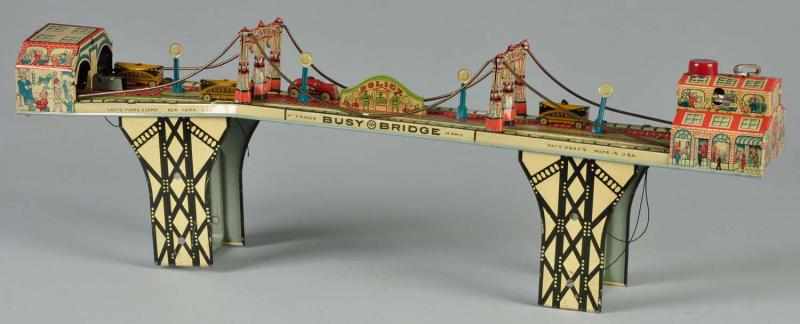 Appraisal: Tin Litho Marx Busy Bridge Wind-Up Toy Description American Working