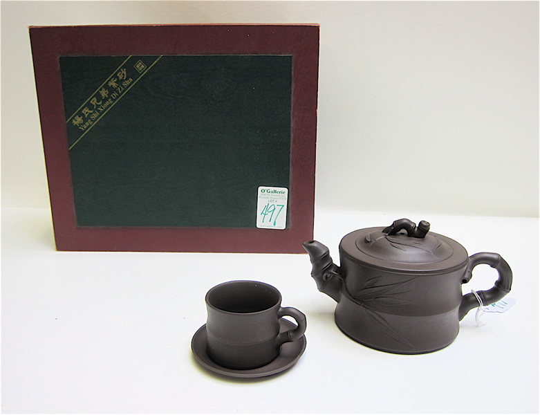 Appraisal: CHINESE REDWARE TEA SET thirteen pieces consisting of tea pot