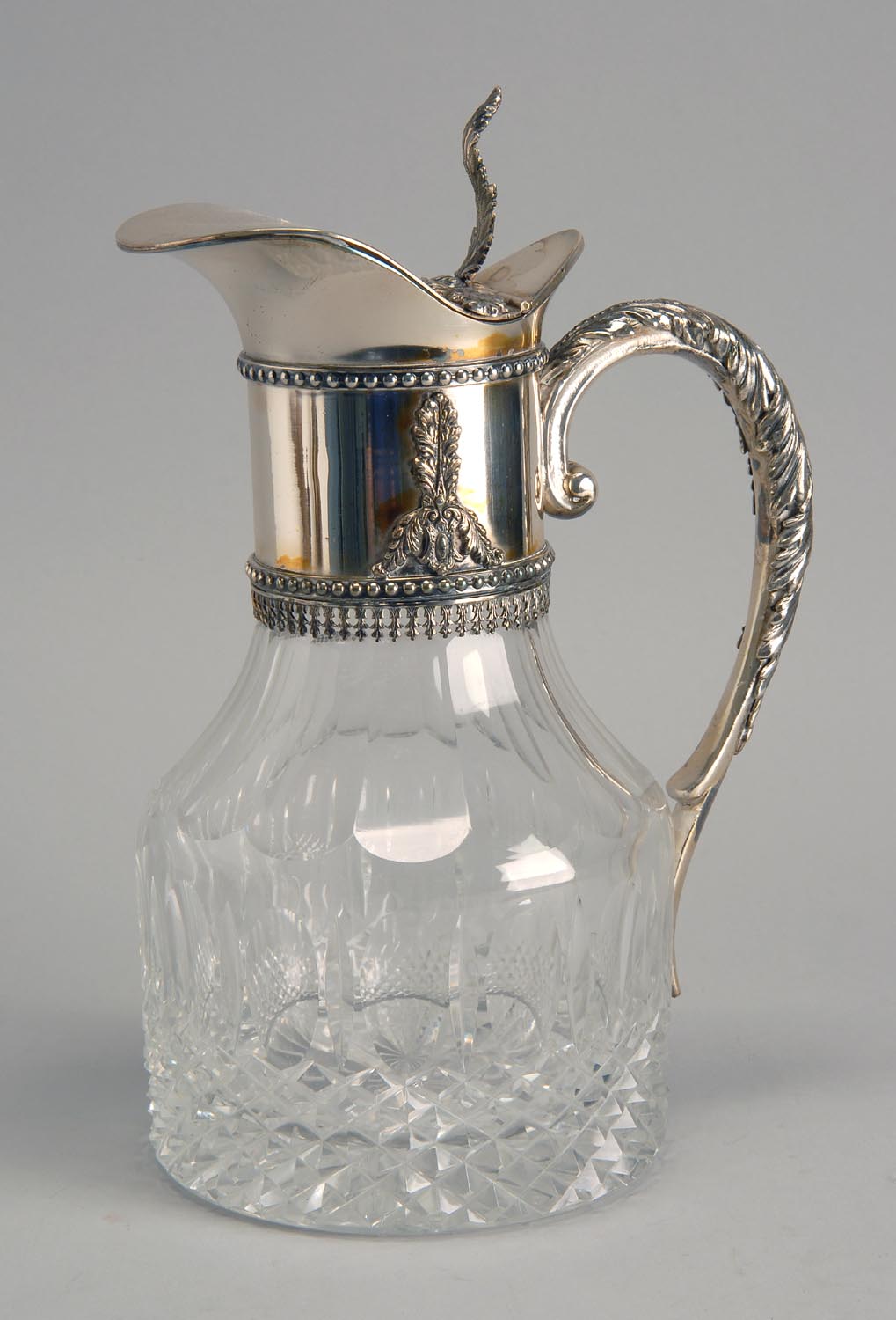 Appraisal: CONTINENTAL SILVER CUT-GLASS DECANTER With diamond and thumbprint design Marked