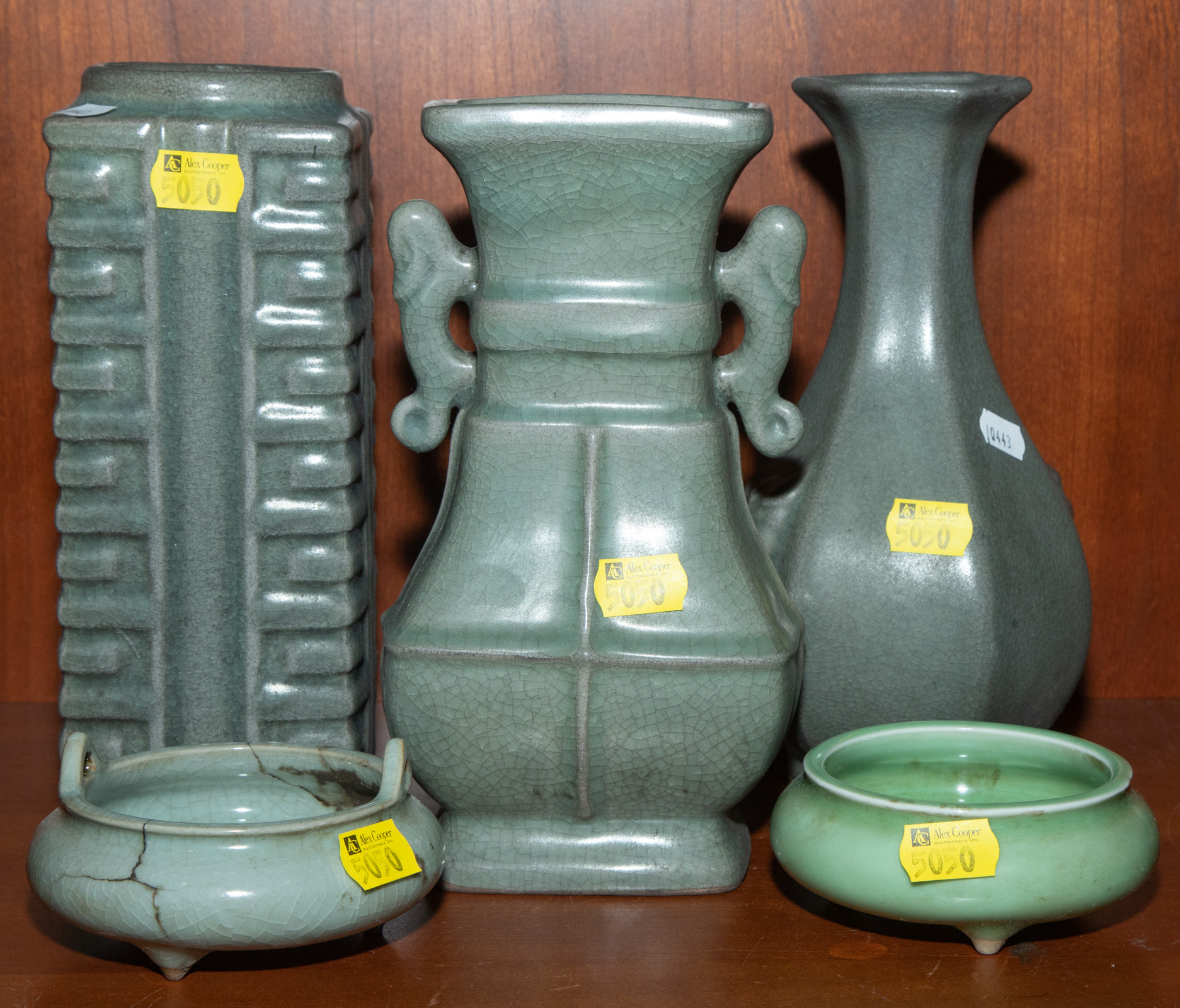 Appraisal: FIVE CHINESE CELADON ARTICLES Includes Kong vase pair of footed