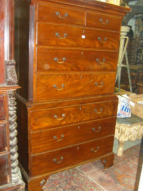 Appraisal: A Georgian mahogany chest on chest the upper section fitted