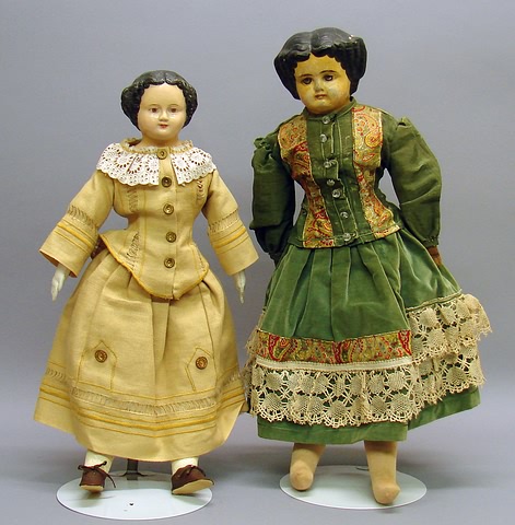 Appraisal: Pair of Superior type papier mache dolls with molded black