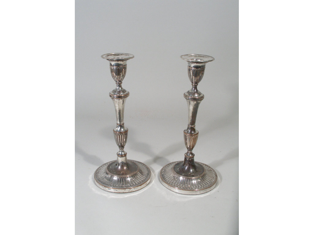 Appraisal: Pair of Sheffield Candlesticks th c shaft raised on round