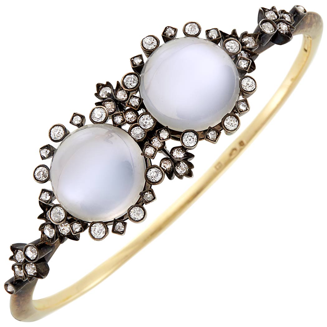 Appraisal: Antique Gold Moonstone and Diamond Bangle Bracelet round cabochon moonstones