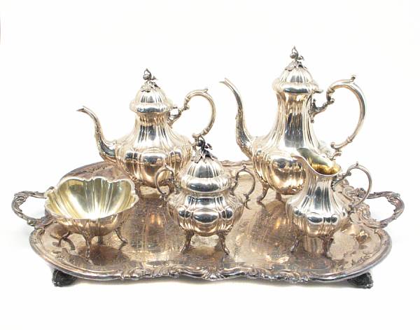 Appraisal: A sterling five piece tea and coffee set with plated