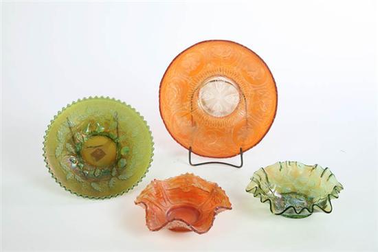 Appraisal: FOUR CARNIVAL GLASS BOWLS Orange Dragon and Lotus d Green