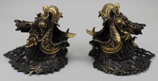 Appraisal: Antique Bronze Tibetan Figural Wall Accessories Antique Bronze Tibetan Figural