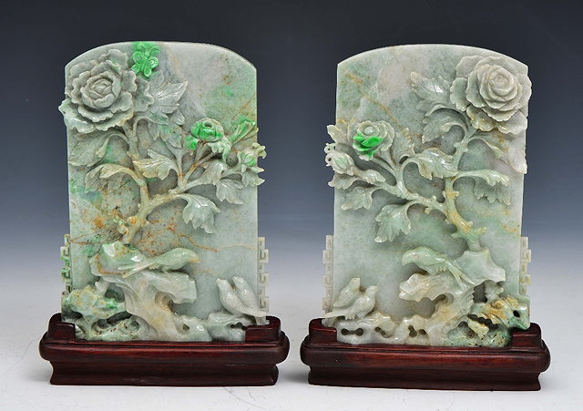 Appraisal: A PAIR OF CHINESE JADEITE CARVED SCREENS birds resting beneath