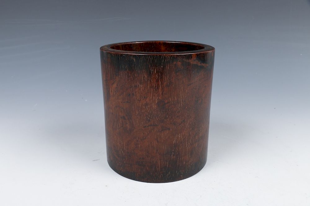 Appraisal: HARDWOOD BRUSHPOT QING DYNASTY Of cylindrical body on a flat