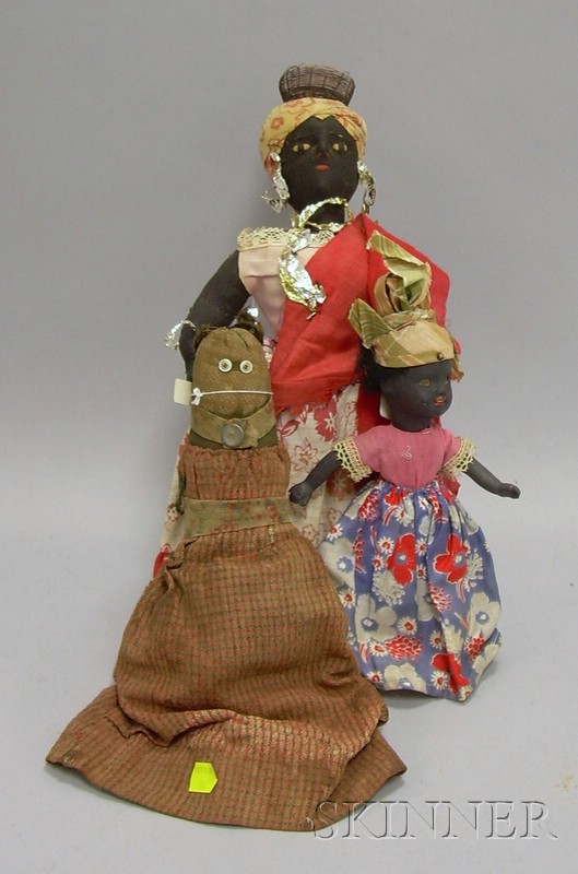 Appraisal: Two Folk Cloth Black Dolls and a Bisque Black Doll