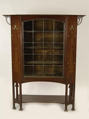 Appraisal: An English Arts and Crafts display cabinet inlaid with softwood