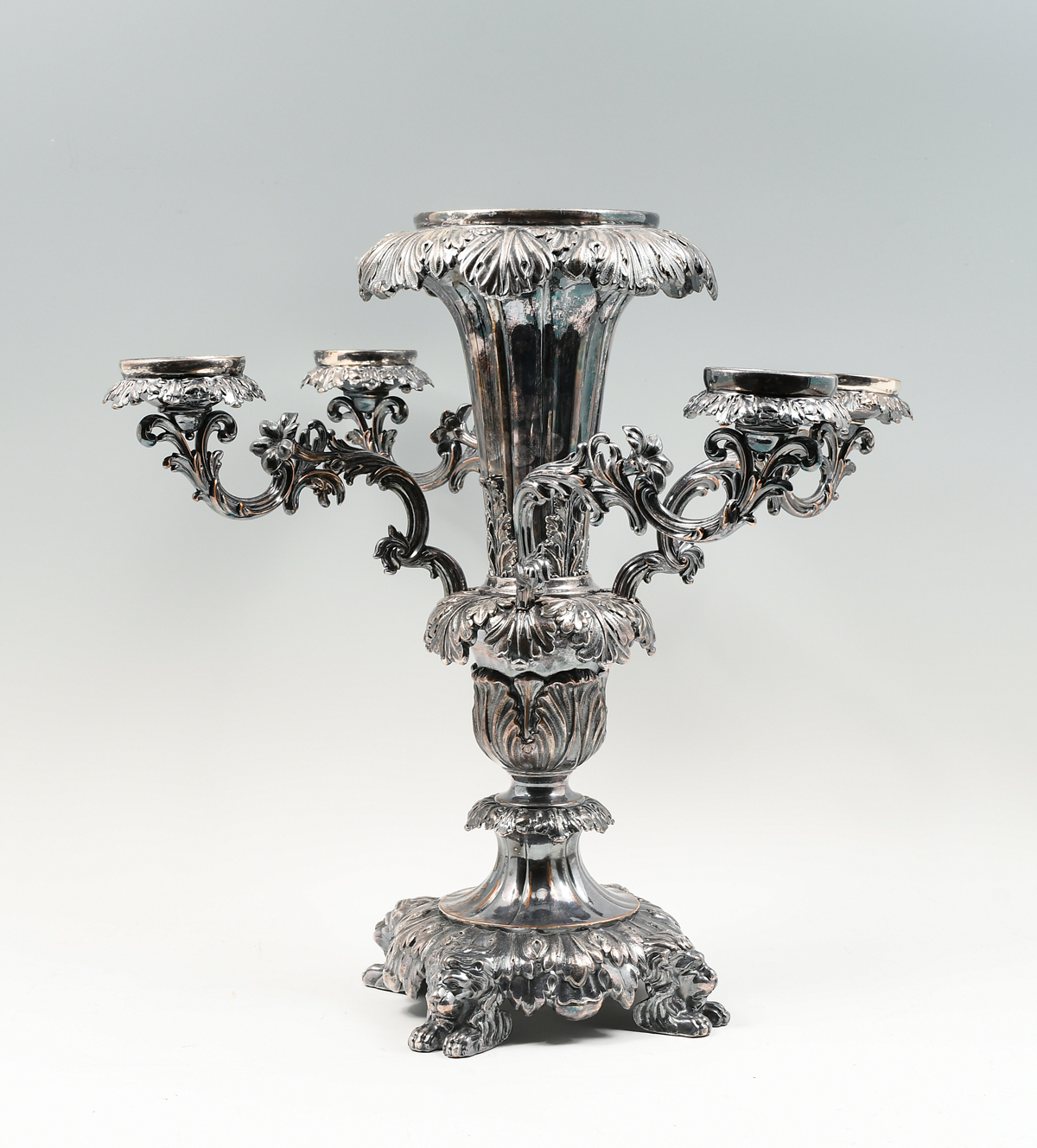 Appraisal: HIGHLY ORNATE SILVERPLATED EPERGNE Large Foliate motif - Arm Epergne