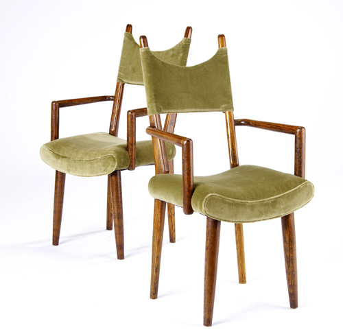 Appraisal: STYLE OF JEAN ROYERE Pair of oak armchairs covered in