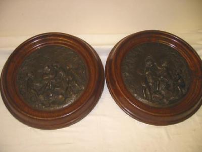 Appraisal: A PAIR OF FRENCH BRONZE PLAQUES of circular form modelled