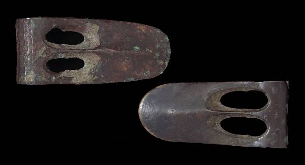 Appraisal: A lot of two Bronze Age fenestrated bronze axe headscirca