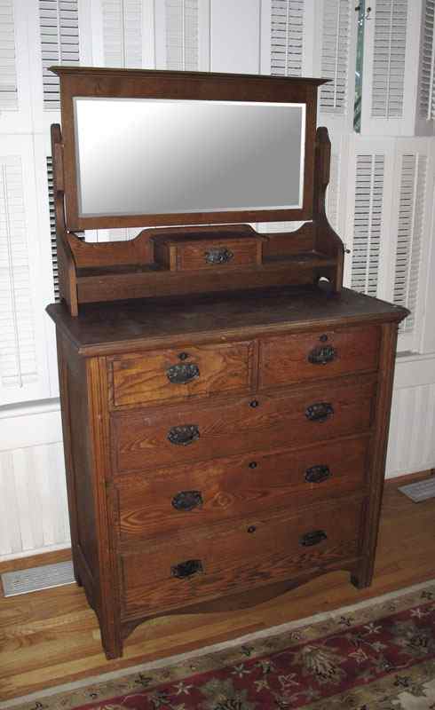 Appraisal: TRANSITIONAL GOLDEN OAK DRESSER AND MIRROR Transitional Victorian to Arts