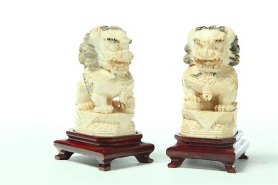 Appraisal: PAIR OF IVORY FOO DOGS Asian st half- th century