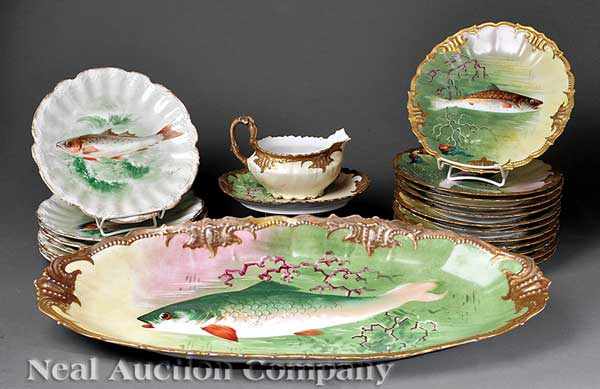 Appraisal: A French Gilt and Polychrome Porcelain Fish Service c Limoges