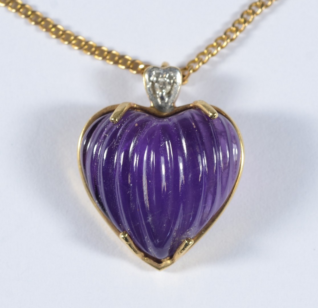 Appraisal: K YG amethyst ribbed heart shaped pendant small diamond h