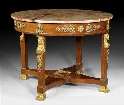 Appraisal: ROUND MAHOGANY TABLE AUX CARIATIDES II Empire Paris circa With