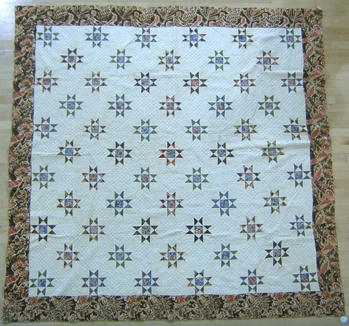 Appraisal: Pieced quilt with chintz border early th c x