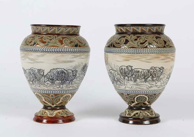 Appraisal: A PAIR OF VICTORIAN DOULTON STONEWARE VASES each with scratched