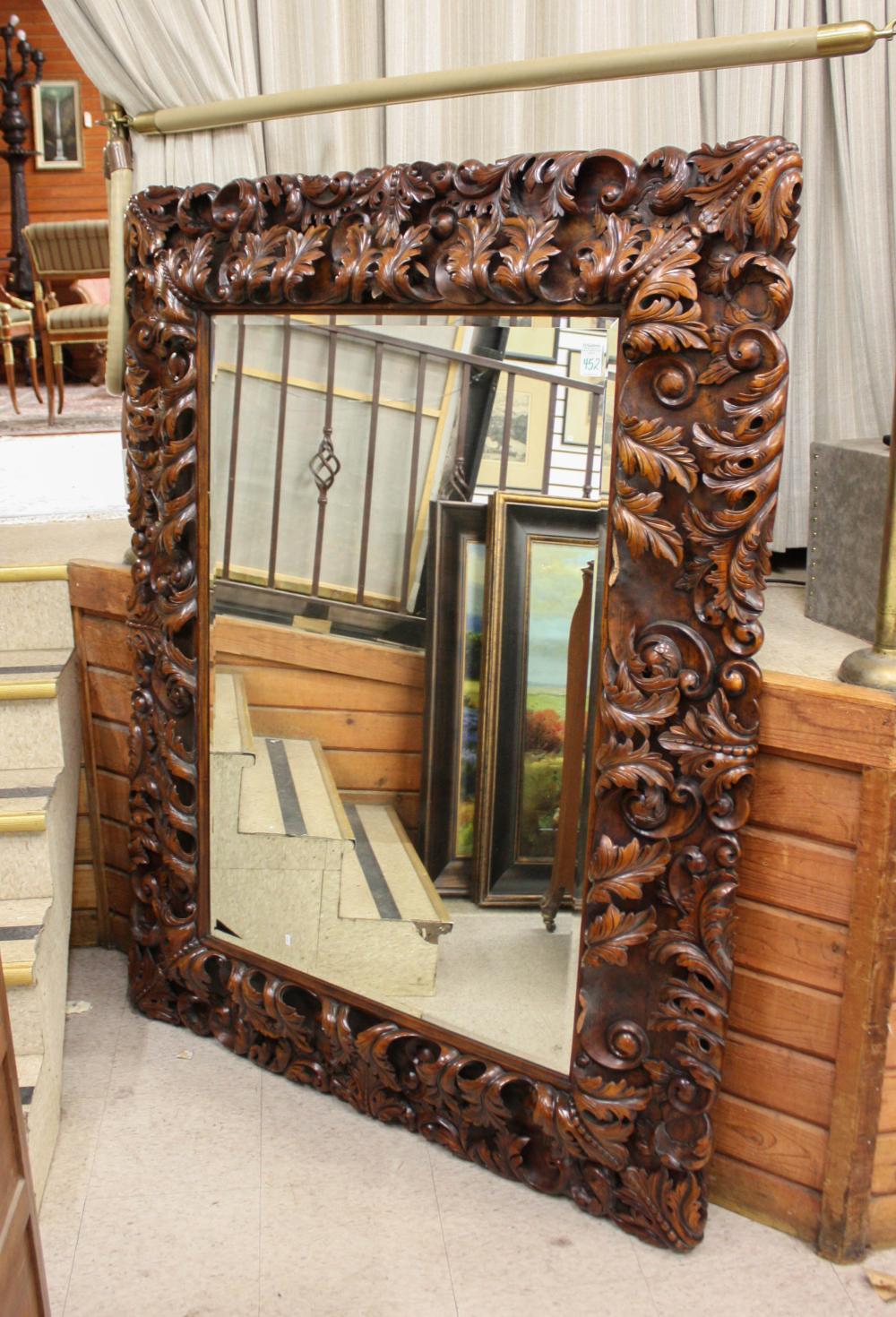 Appraisal: LARGE CARVED MAHOGANY BAROQUE STYLE WALL MIRROR Theodore Alexander Furniture