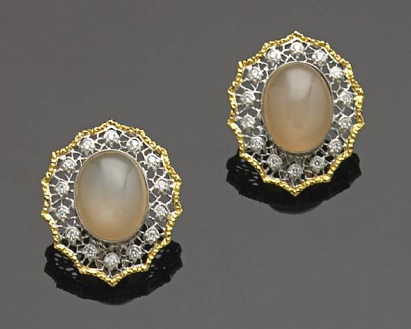 Appraisal: A pair of moonstone diamond and k two-tone gold earrings