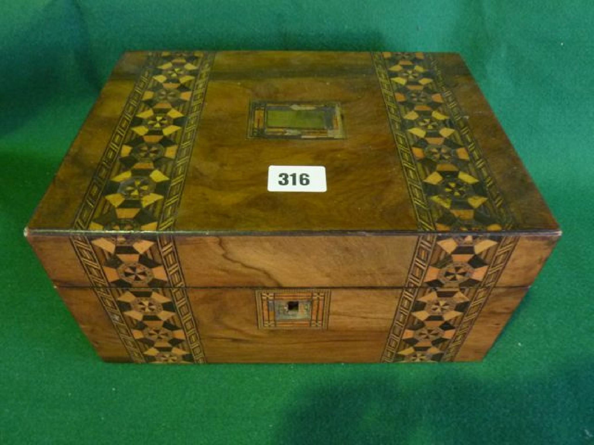 Appraisal: Victorian walnut and straw work marquetry box containing a mixed