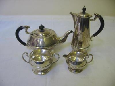 Appraisal: A FOUR PIECE TEA SET of bellied form the domed