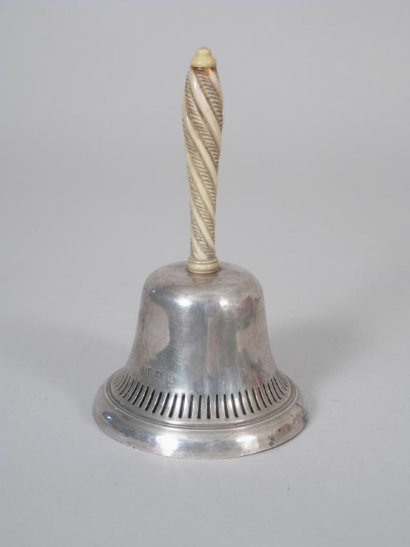 Appraisal: A George III Table Bell engraved crest pierced frieze and