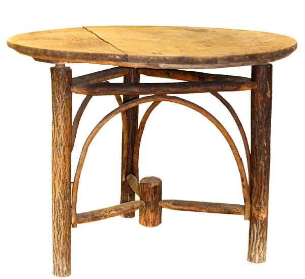 Appraisal: A bent twig patio table losses to top height in