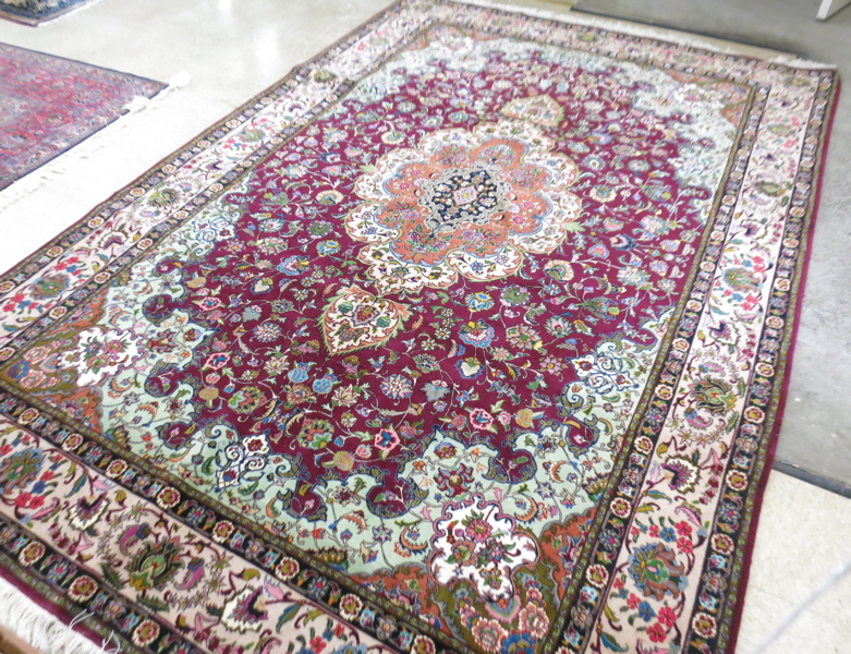 Appraisal: FINE PERSIAN SILK AND WOOL CARPET hand knotted in a