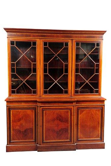 Appraisal: An Edwardian mahogany library bookcase banded in satinwood the moulded