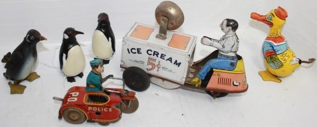 Appraisal: LOT OF TIN LITHOGRAPH WIND-UP TOYS ALONG WITH PLASTIC BREBA