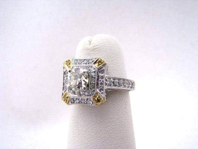 Appraisal: K white and yellow gold diamond ring with yellow diamond