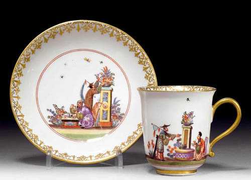 Appraisal: CHINOISERIE-DECORATED CUP AND SAUCER Meissen circa - Depiction of tea