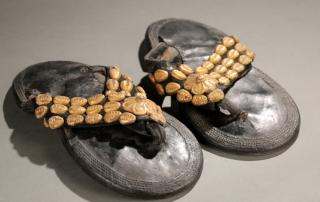 Appraisal: Akan sandals with gold leaf th century Akan gold leaf