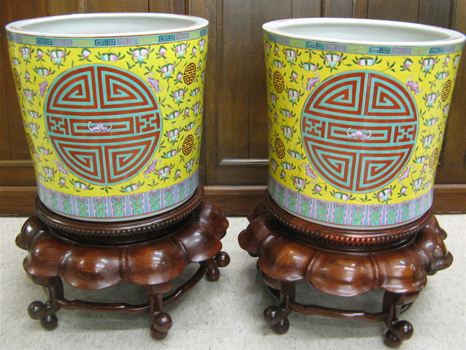 Appraisal: A LARGE PAIR OF CHINESE PORCELAIN JARS ON STANDS the