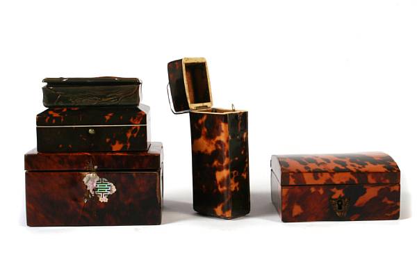 Appraisal: A group of four tortoiseshell boxes together with a horn