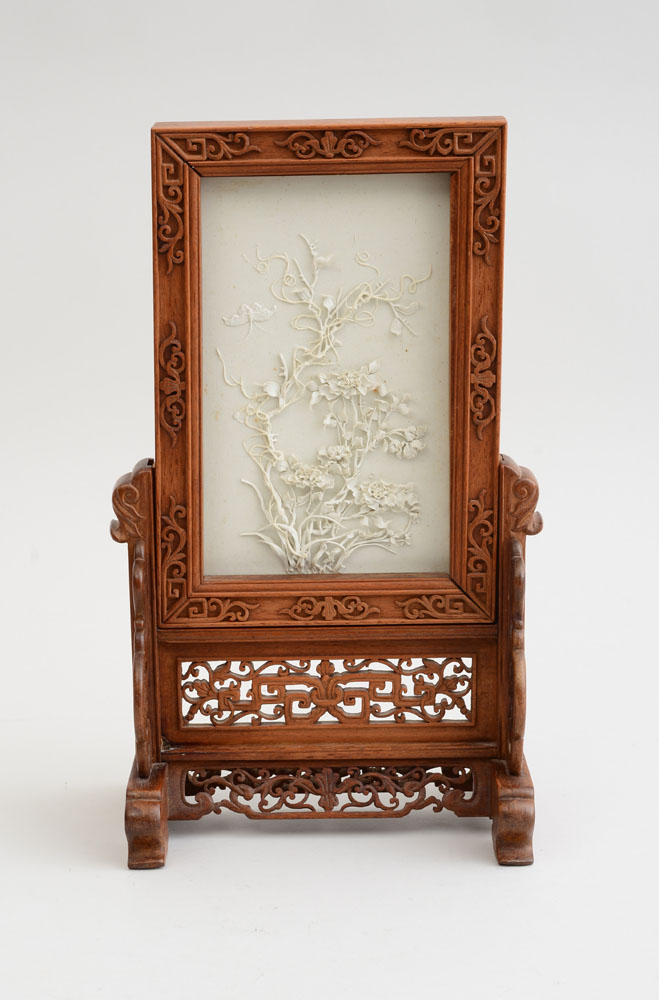 Appraisal: CHINESE BISQUE PORCELAIN PLAQUE IN CARVED HARDWOOD FRAME FORMING A