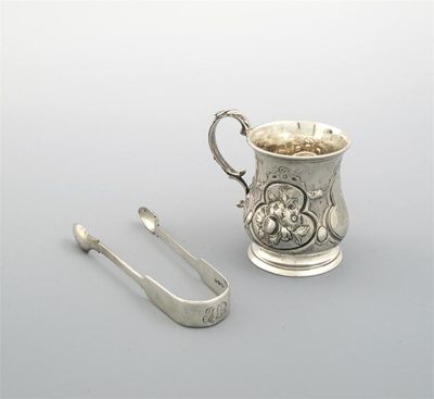 Appraisal: A Victorian small embossed mug of squat baluster form initialled